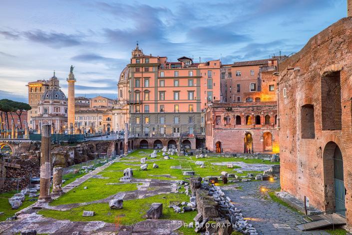The Ruins of Roman's forum in Rome with a beautiful colorful sky in the background - Rome, Italy - Travel image