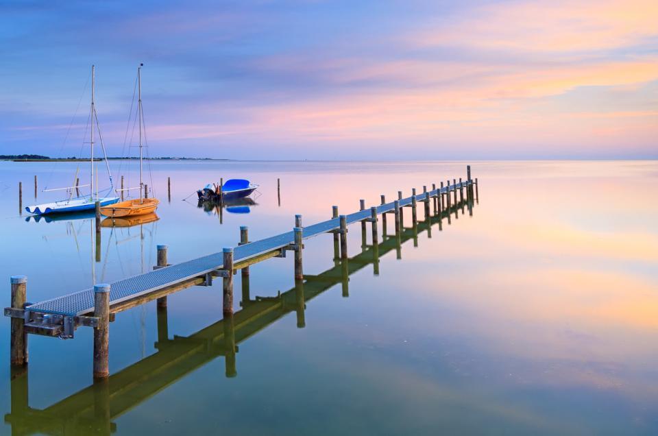 A tranquil and calm summer evening at Lake IJsselmeer near Hindeloopen, The Netherlands